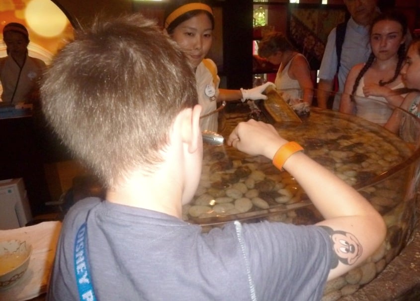Buying a Oyster at Japan at Epcot Walt Disney World www.extraordinarychaos.com