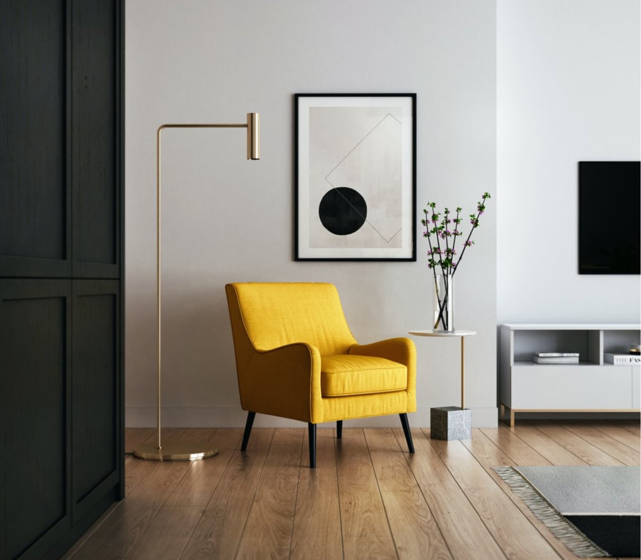 A metallic lamp behind a yellow chair in a living room