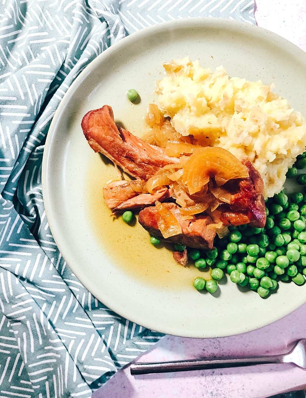 Cider cooker Gammon in the slow cooker with onions with mash and peas