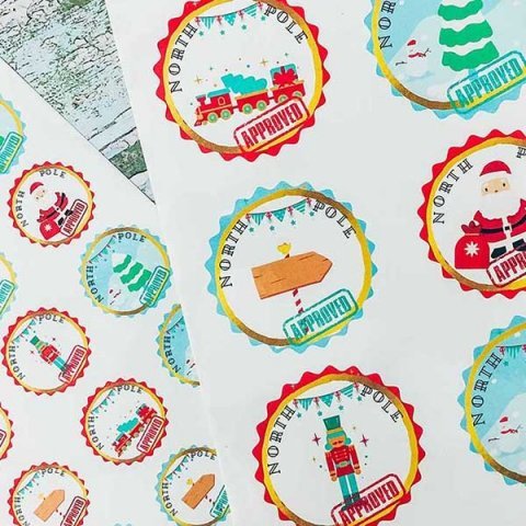 Free Printable Print and Cut North Pole Stamp Stickers to cut out by hand or on a cricut, perfect for using to wrap gifts or seal envelopes.