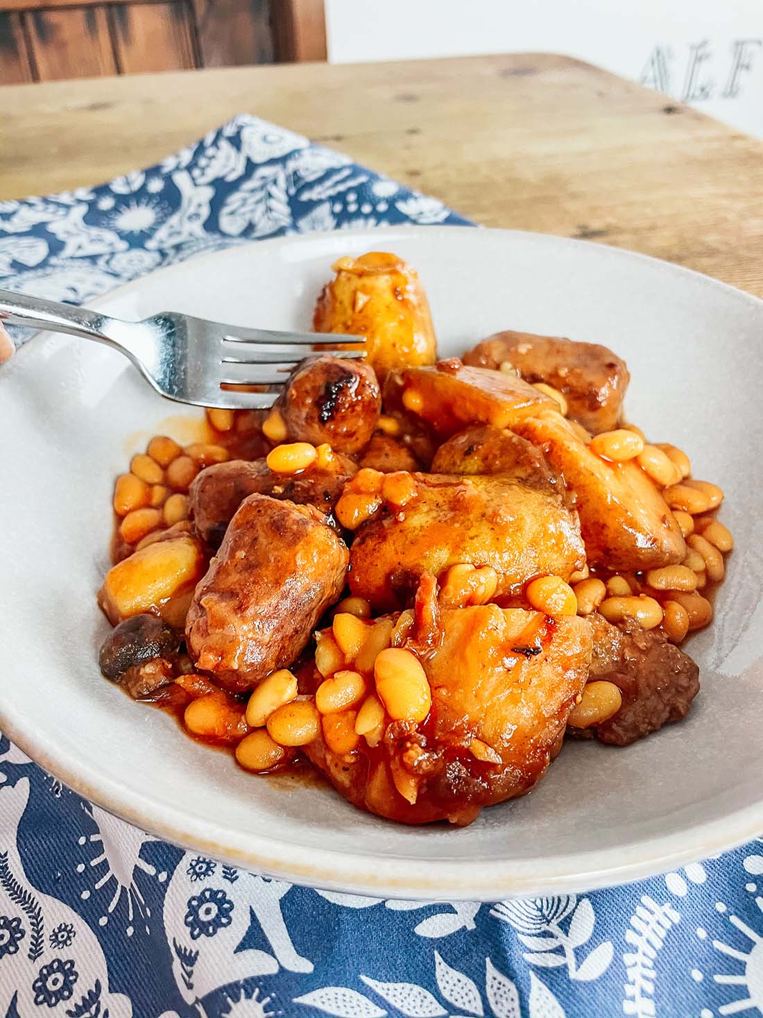 Sausage and bacon casserole with beans