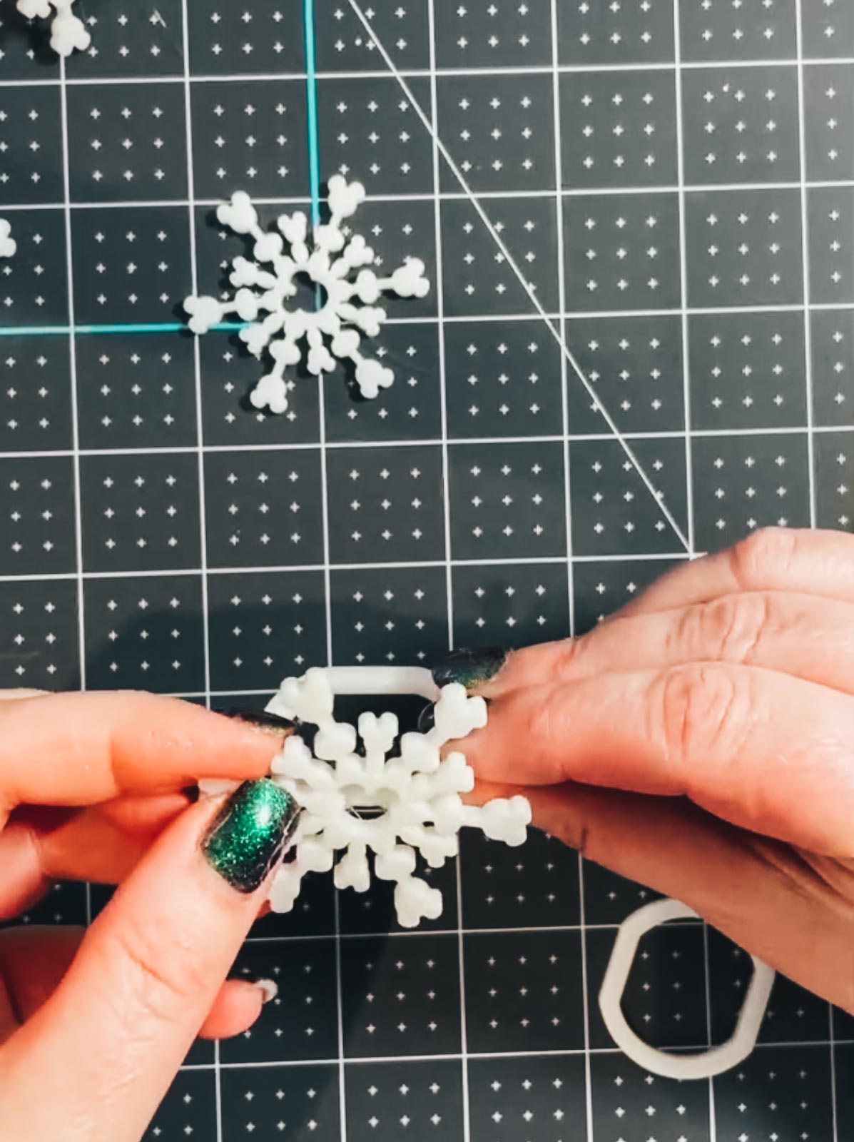 Glue your snowflake to the shank to make a napkin holder